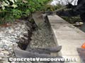 Filter cloth and drain rock for Allan Block retaining wall in Ladner / Tsawwassen, BC, Canada