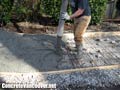 Pumping concrete for sidewalk in Burnaby, BC, Canada