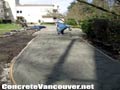 Skreeding and placing concrete sidewalk in Burnaby, BC, Canada
