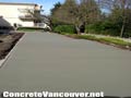 Broom finish concrete sidewalk in Burnaby, BC, Canada