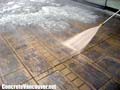 Pressure washing the concrete surface, Langley, BC, Canada