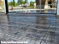Desert Tan colored stamped concrete with Italian Slate pattern in Langley, BC,  Canada