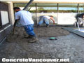 Placing the stamped concrete mix for pool deck in North Vancouver, BC, Canada