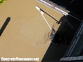 Bull floating the stamped concrete mix for pool deck in North Vancouver, BC, Canada