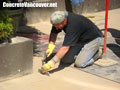 Chiseling finer details in stamped concrete pool deck in North Vancouver, BC, Canada