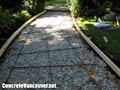 Clear crush gravel and wood forming preparation for a sidewalk in Vancouver, BC, Canada