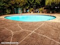 Stamped Concrete Swimming Pool Deck Repair in North Vancouver, BC, Canada