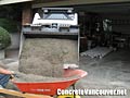 Loading wheelbarrow with road base with our bobcat in loader Ladner / Tsawwassen, BC, Canada