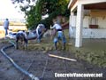 Placing and screeding concrete for patio deck in Ladner / Tsawwassen, BC, Canada