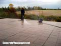 Pressure washing finished stamp concrete patio deck in Ladner / Tsawwassen, BC, Canada