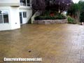 Job complete!  Slate tile stamp concrete pattern with Champagne color and dark brown release for patio deck in Ladner / Tsawwassen, BC, Canada