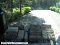 Bobcat loaded with old pavingstones in Whistler, BC, Canada