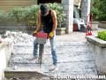 Jack-hammering concrete steps in Whistler, BC, Canada
